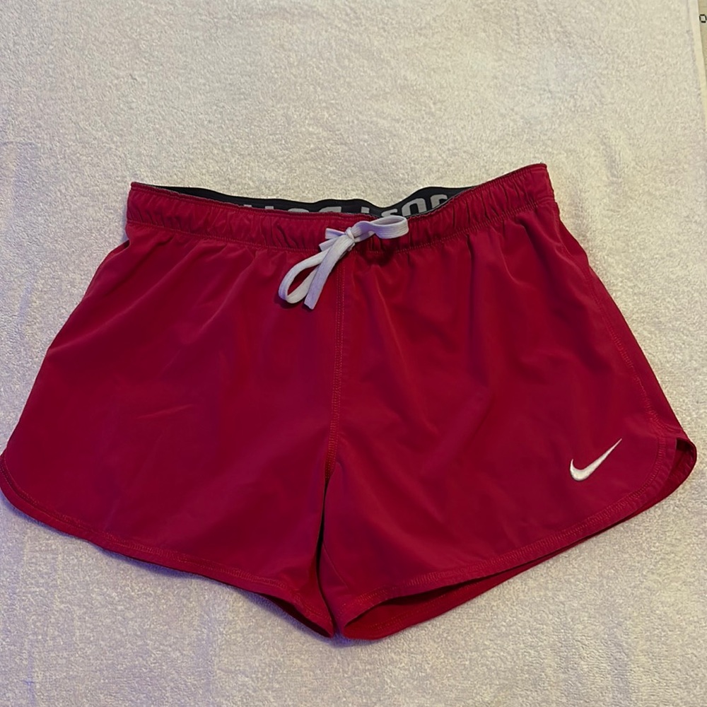 Pink Nike bri-fit small shirts